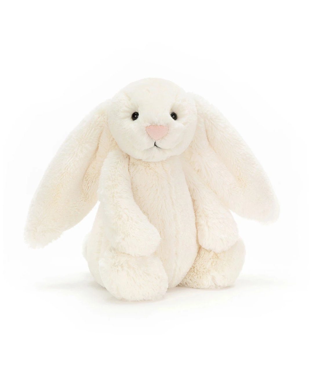 A plush cream-colored bunny toy with long floppy ears, small black eyes, and a pink nose, sitting on a clean white background.