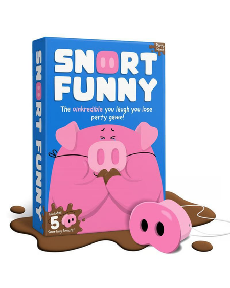 The 'Snort Funny' party game box and its pink pig nose accessory, styled with a brown fake mud puddle on a white background.