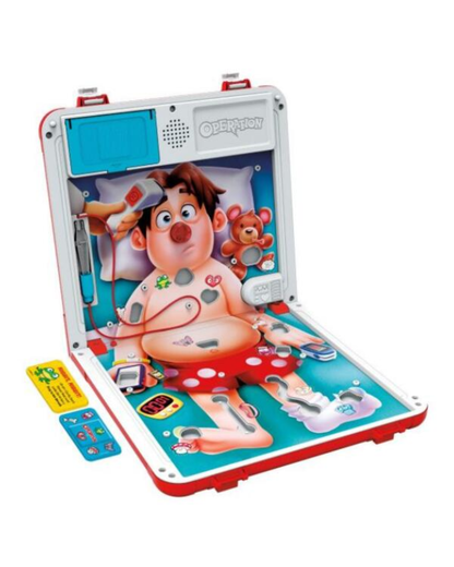 Operation board game case shown open on a white background. The case features a cartoon patient, a teddy bear, and various colorful medical play elements including a stethoscope, thermometer, and control buttons on a small card.