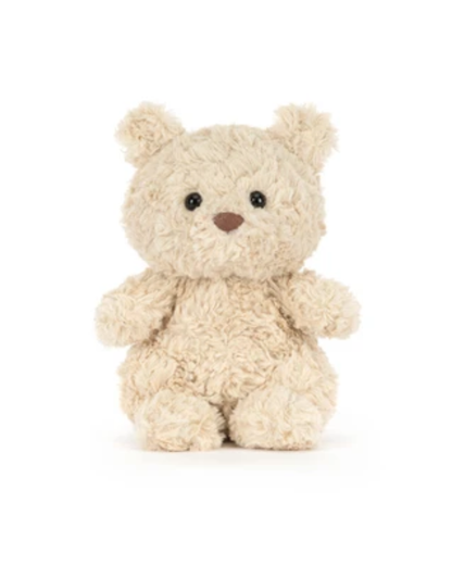 A small plush teddy bear with curly cream-colored fur, black bead eyes, and a brown stitched nose, sitting against a plain white background.