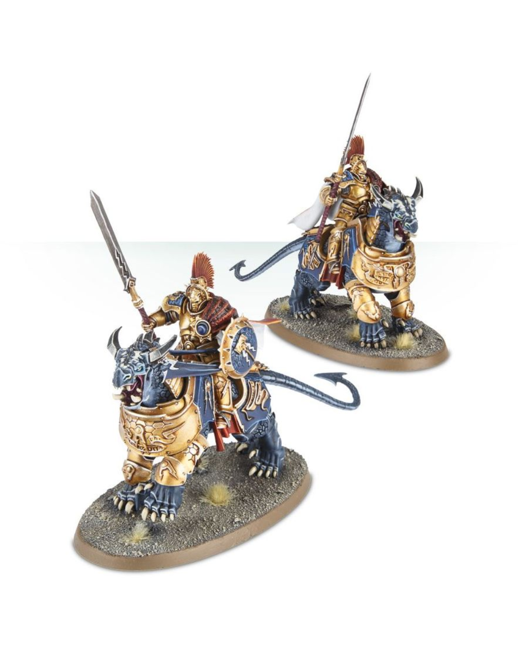 Warhammer miniatures in front of plain white background