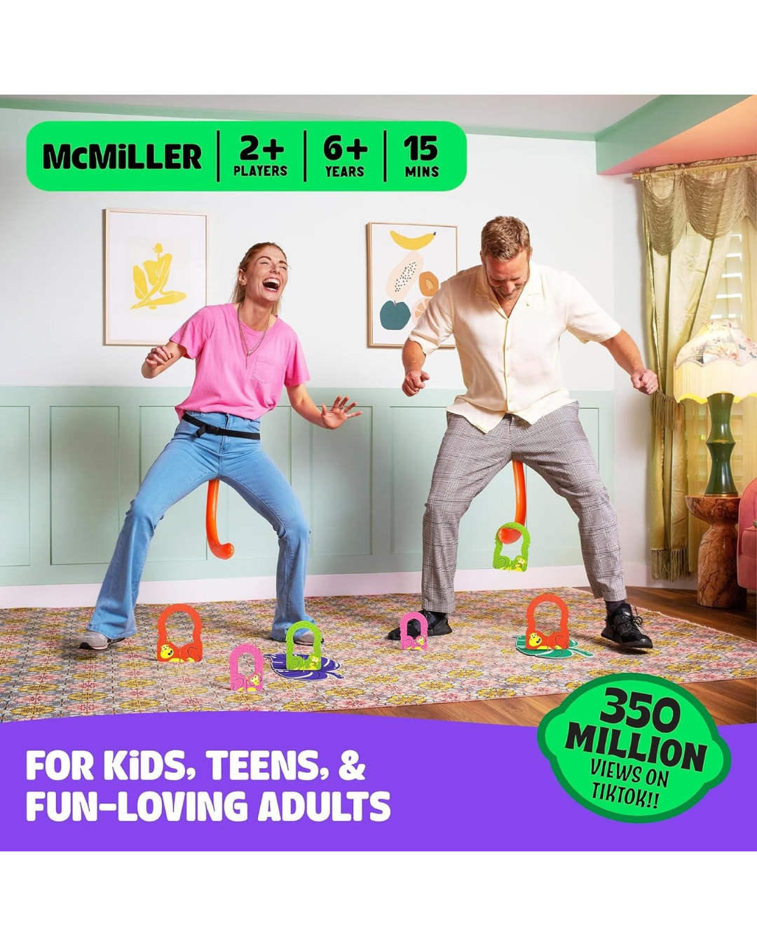 Two adults playing a colorful dance game in a decorated room, with hanging letters and legs on the floor. Prominent text overlays read 'McMILLER', '2+ PLAYERS', '6+ YEARS', '15 MINS', and 'FOR KIDS, TEENS, & FUN-LOVING ADULTS' with a green badge saying '350 MILLION VIEWS ON TIKTOK!!'.
