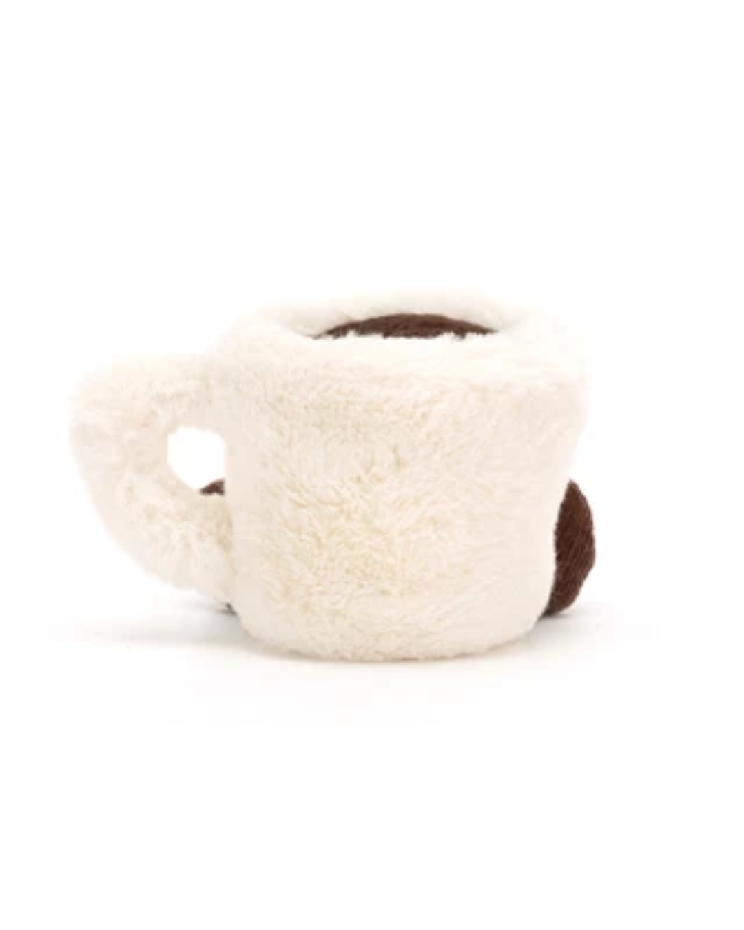 A plush, fuzzy novelty mug toy or pillow in off-white with dark brown accents, shown on a plain white background.