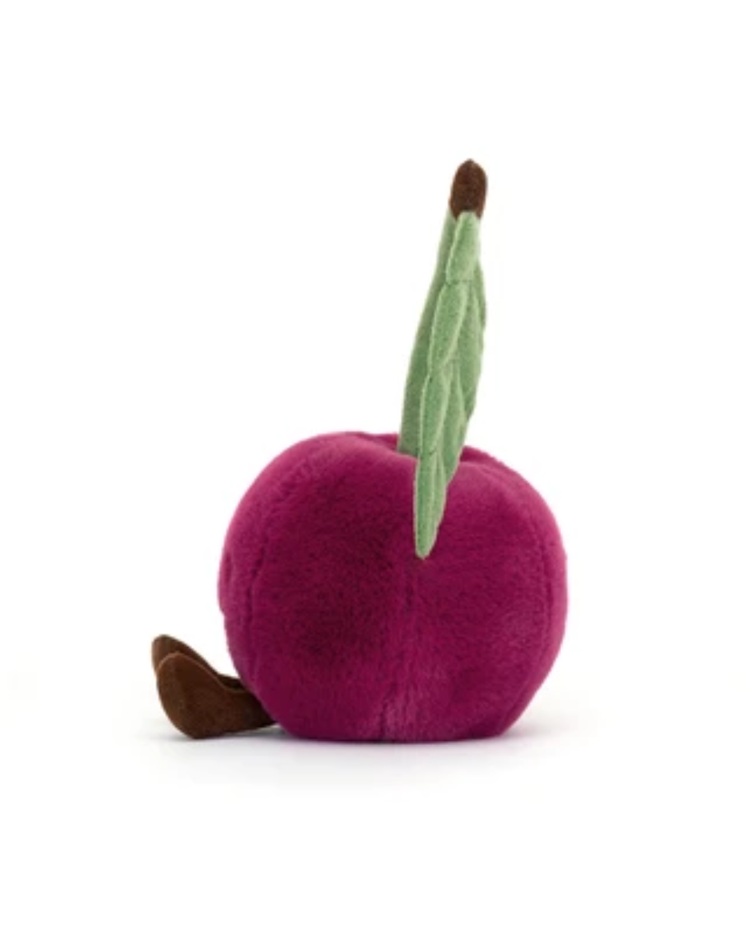 A plush toy shaped like a magenta-purple apple with a green leaf and brown stem, photographed on a clean white background.