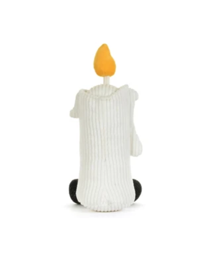 A white ribbed knit plush candle figure with a yellow-orange flame on top and small black feet, shown from the back on a plain white background.