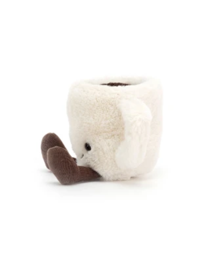A plush, fuzzy novelty mug toy or pillow in off-white with dark brown accents, shown on a plain white background.