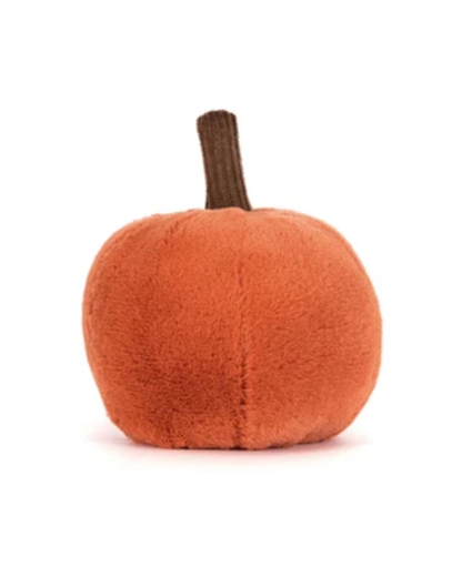 A small plush pumpkin toy in a warm orange-brown color with a short dark brown stem, photographed on a clean white background.