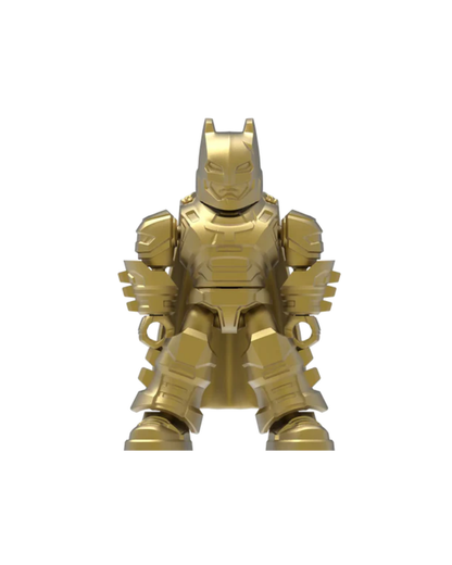 A metallic gold Batman minifigure standing against a plain white background.