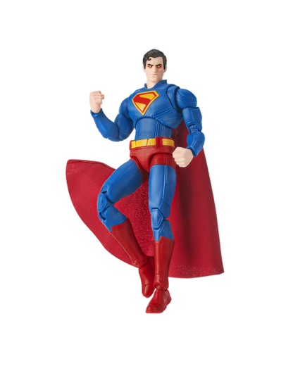 Superman action figure posed mid-leap with a red cape, blue suit, and yellow belt on a plain white background.