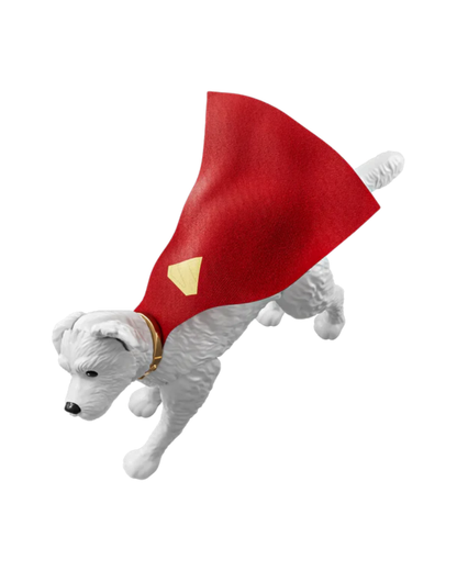 Krypto the Superdog figurine wearing a red cape with Superman emblem, shown on a plain white background.