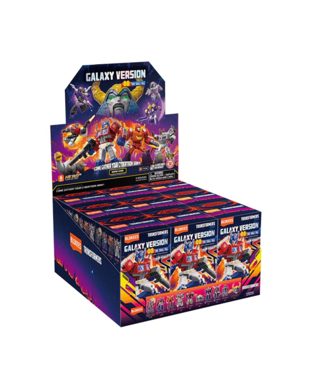 A large retail display box filled with small Transformers Galaxy Version blind boxes shown on a plain white background. The packaging features colorful comic-style artwork with multiple robot characters and the text 'Galaxy Version' and 'Transformers'.