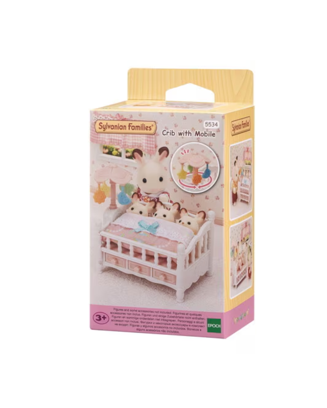 Sylvanian Families Crib with Mobile toy set in its original retail packaging, featuring a white wooden crib with pink bedding and a mobile, shown on a plain white background.