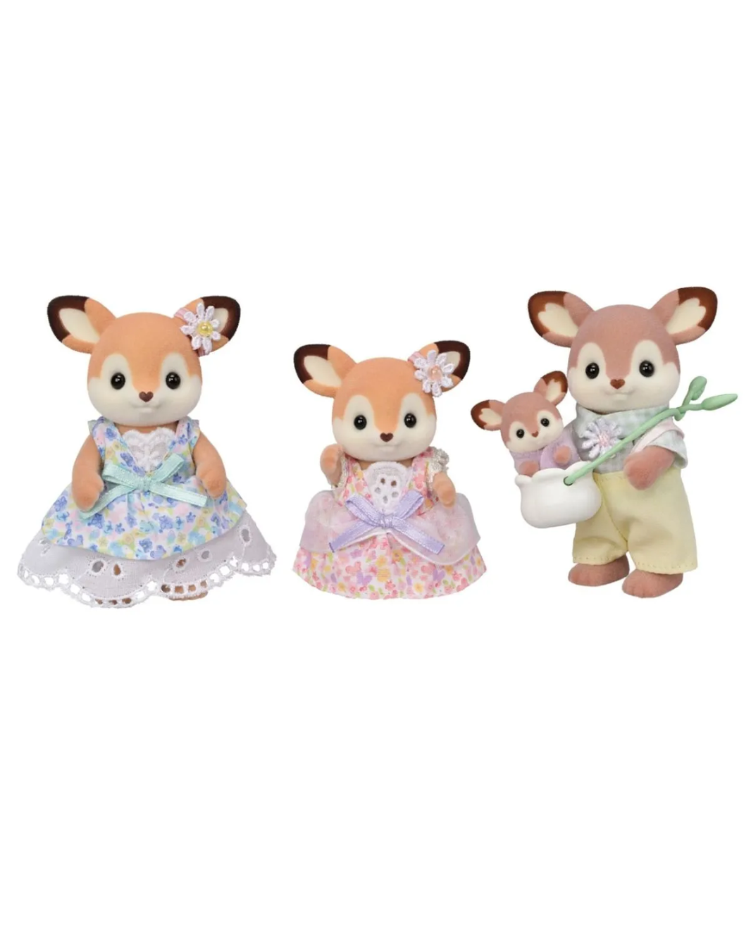 Three Sylvanian Families animal toy figures on a plain white background: a deer mother with a blue floral dress, a deer father with a pastel floral dress and holding a small baby figure, and a small baby deer in a white outfit.