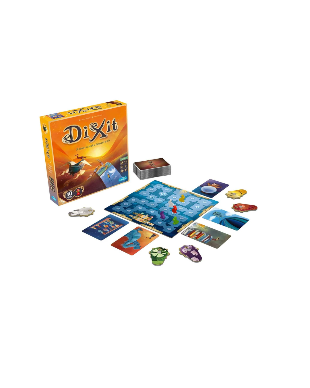 The board game 'Dixit' shown with its yellow and orange illustrated box, a blue game board, cards, tokens, and other components arranged on a plain white background.