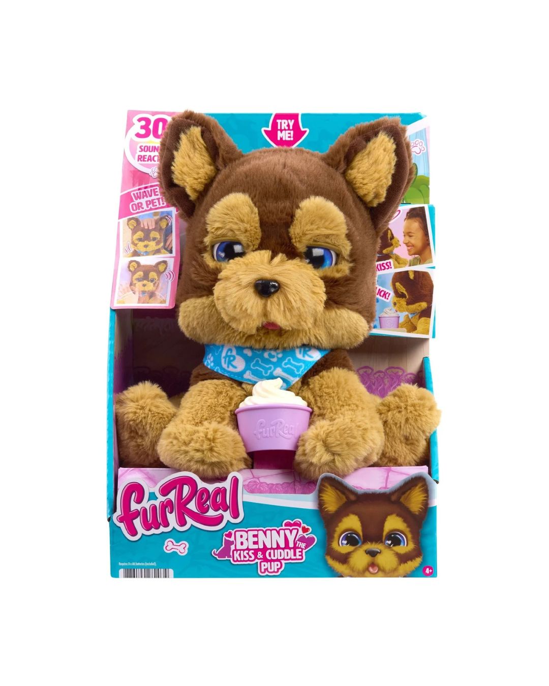 FurReal Benny the Kiss & Cuddle Puppy retail packaging, featuring a plush puppy toy holding a cupcake accessory, situated on a white background.