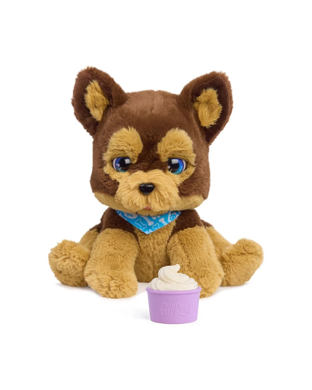 FurReal Benny the Kiss & Cuddle Puppy featuring Benny the plush puppy toy outside of his retail box, holding a cupcake accessory, situated on a white background.