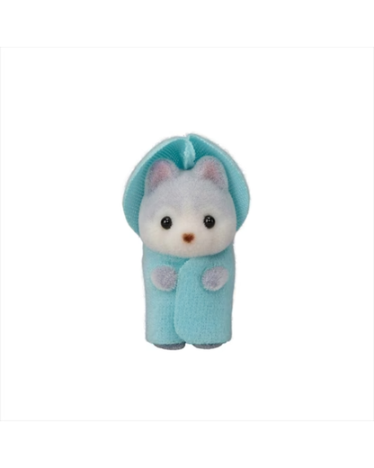 A baby sylvanian huskey with a white face and ears, dark eyes, and a light blue hooded outfit, centered on a plain white background.