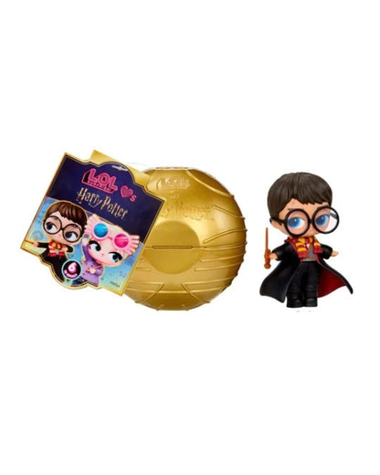 A LOL Surprise x Harry Potter blind bag toy set on a white background, featuring a gold foil-wrapped bag, a branded card, and a small chibi Harry Potter figure.