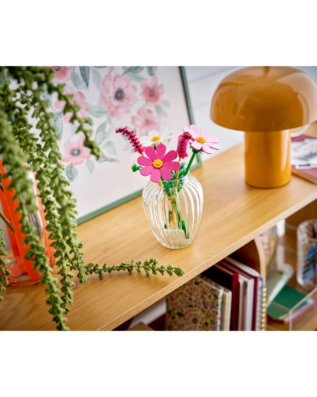 LEGO 11514 Cosmos Flowers V29 in vase displayed on shelf background at home.