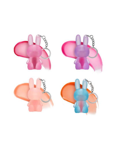 Four translucent bunny keychains arranged in a 2x2 grid on a white background, each with a different pastel color combination: pink, purple, peach, and blue.