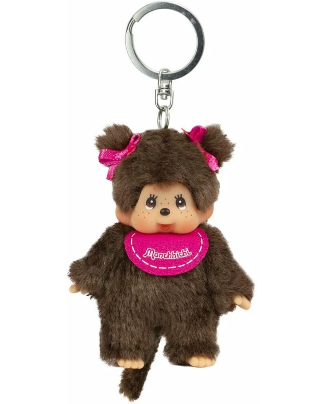 A Monchhichi plush keychain featuring a brown furry character with pink bows and a pink bib, attached to a silver metal key ring, shown against a plain white background.