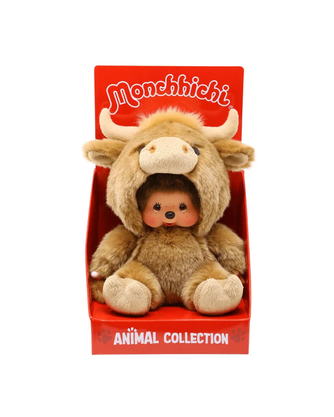 A Monchichi monkey plush toy wearing a brown buffalo costume, displayed inside its red retail packaging box labeled 'Monchichi' and 'Animal Collection'.