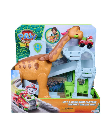 Paw Patrol Dino Lift & Race Dino Playset in its retail packaging, featuring a brown and tan dinosaur toy, a light gray lift structure, and a green vehicle.