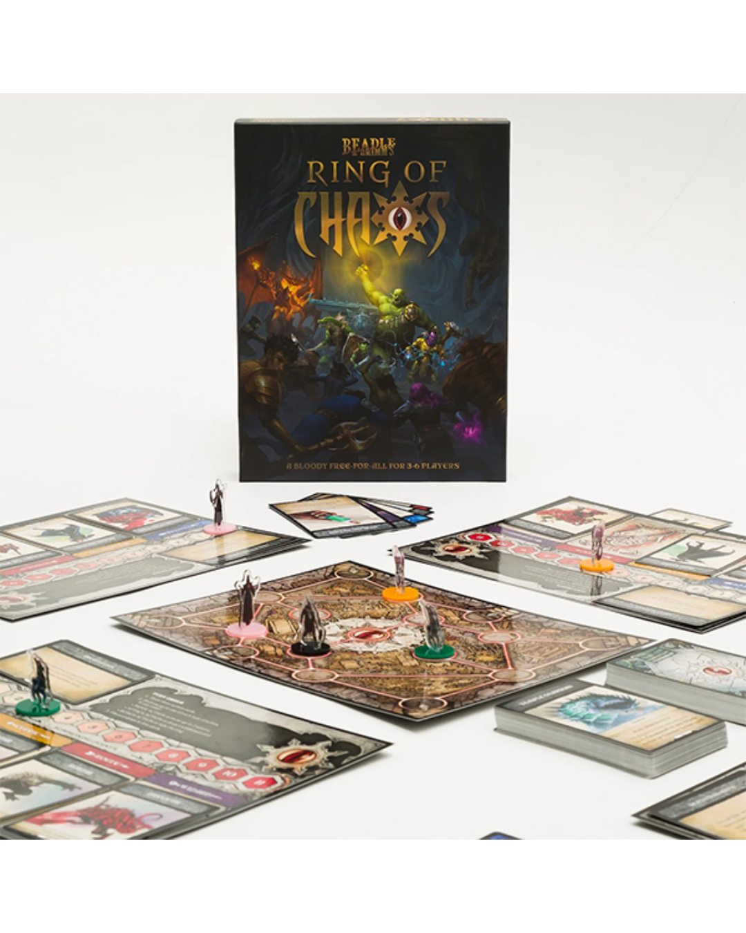 The board game 'Ring of Chaos' and its components are displayed on a clean white background. The main product is the illustrated box standing upright, with the game board, cards, tokens, and miniatures arranged in front of it.