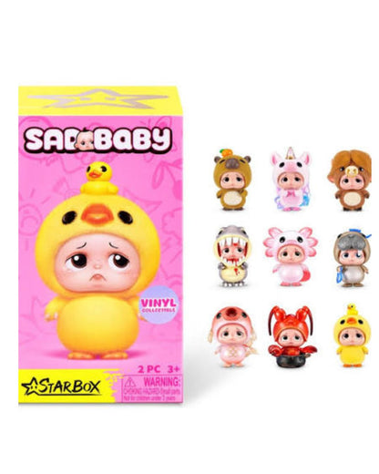 Starbox Baby vinyl collectible figures, showing the pink and yellow retail box on the left and nine different character mini-figures arranged on the right against a white background.