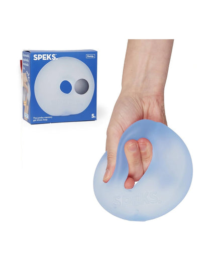 A hand squeezing a translucent light blue Speks stress ball, shown next to its blue retail box on a white background.