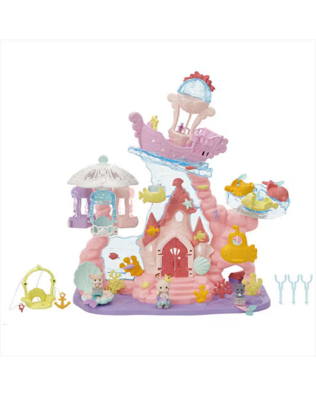 A pastel-colored toy playset featuring a castle, carousel, slide, and small animal figurines on a plain white background.
