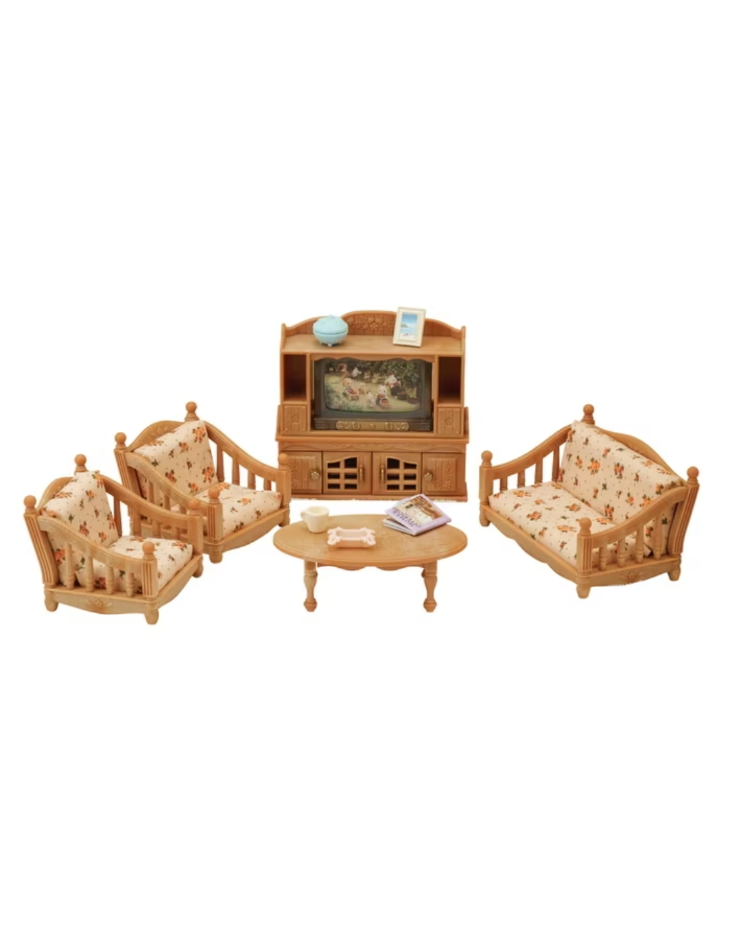 A Sylvanian Families living room furniture set with a wooden TV cabinet, two armchairs, a loveseat, and a coffee table on a plain white background.