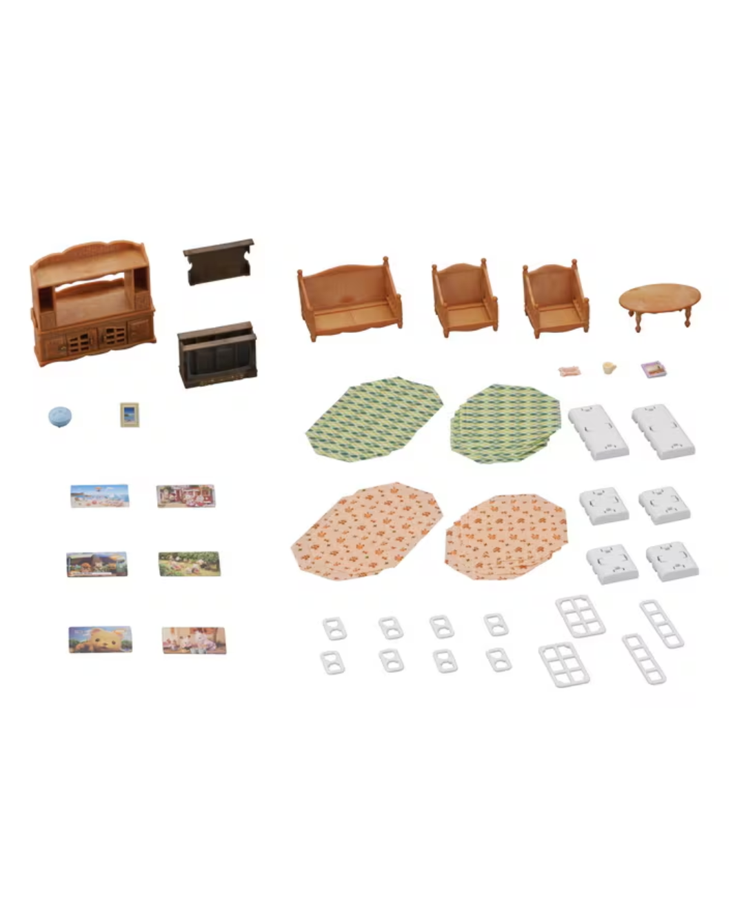 A miniature sylvanian furniture set laid out on a white background, including wooden chairs, a cabinet, a table, patterned rugs, and small accessories.
