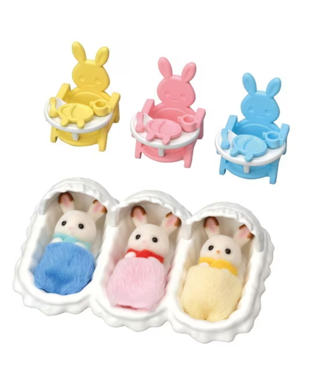 Three Sylvanian Families miniature rabbit baby figures in white, each wrapped in a blue, pink, and yellow blanket, shown with matching high chairs in yellow, pink, and blue on a white background.
