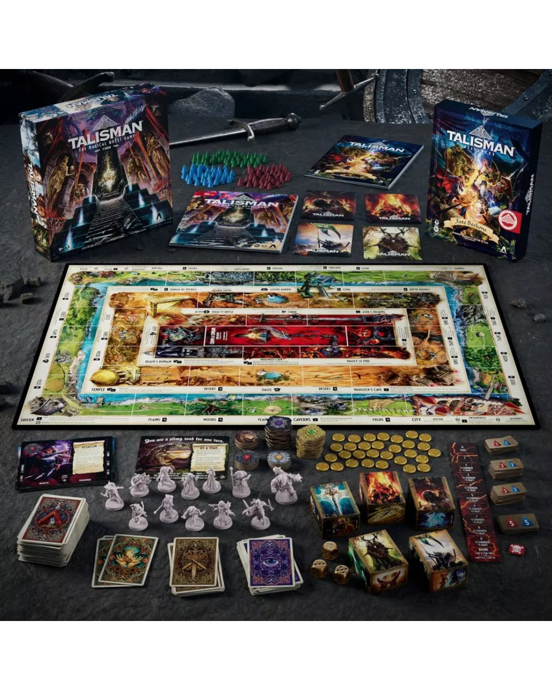 Talisman board game set displayed on a dark tabletop, showing the main game board, retail box, instruction booklet, cards, tokens, dice, coins, and character figures.