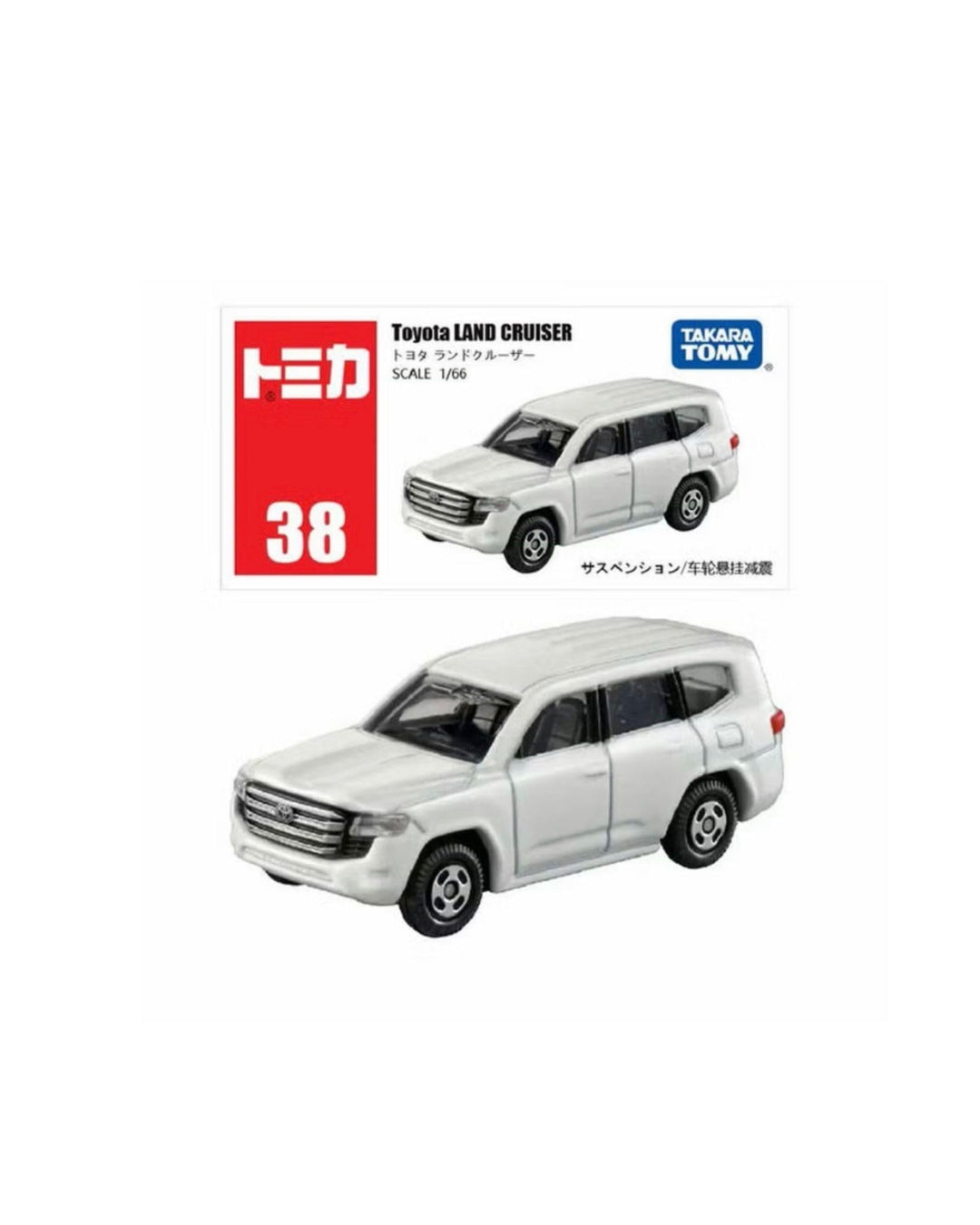 Tomica Tamiya 1:66 scale model car for a No. (38) Toyota Land Cruiser, featuring a white SUV illustration of the car underneath its official red and white retail packaging. 