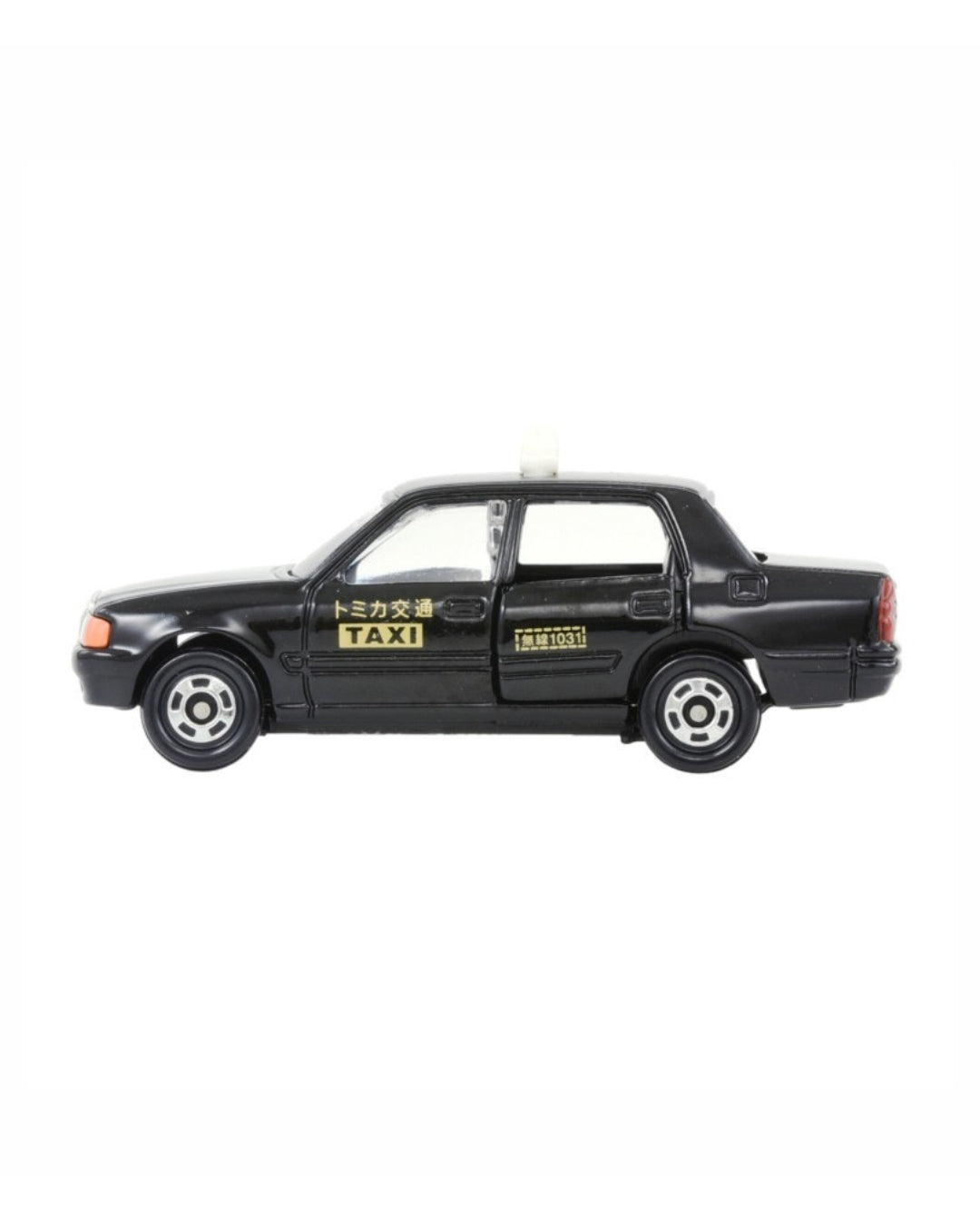 Tomica Tamiya 1:63 scale model car for a No. (51) Toyota Crown Comfort Taxi featuring a black taxi illustration on a white background, with yellow accents and japanese writing. 