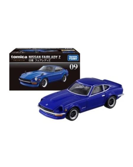 Tomica No. (09), Nissan Fairlady Z die-cast model car shown in front of its retail box on a plain white background.