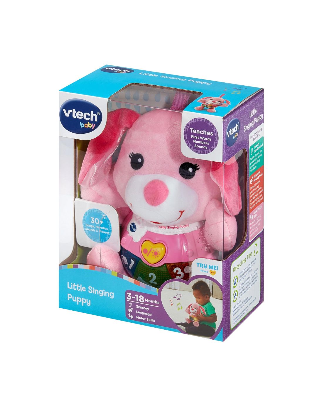 Vtech baby Little Singing Puppy toy in its original retail packaging, featuring a pink plush puppy with a colorful number chest inside a blue and purple box.