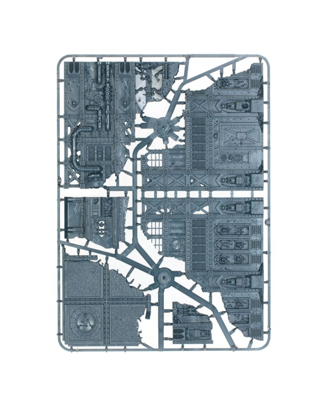 A gray plastic Warhammer 
sprue containing multiple miniature terrain pieces and industrial building components, isolated on a white background.