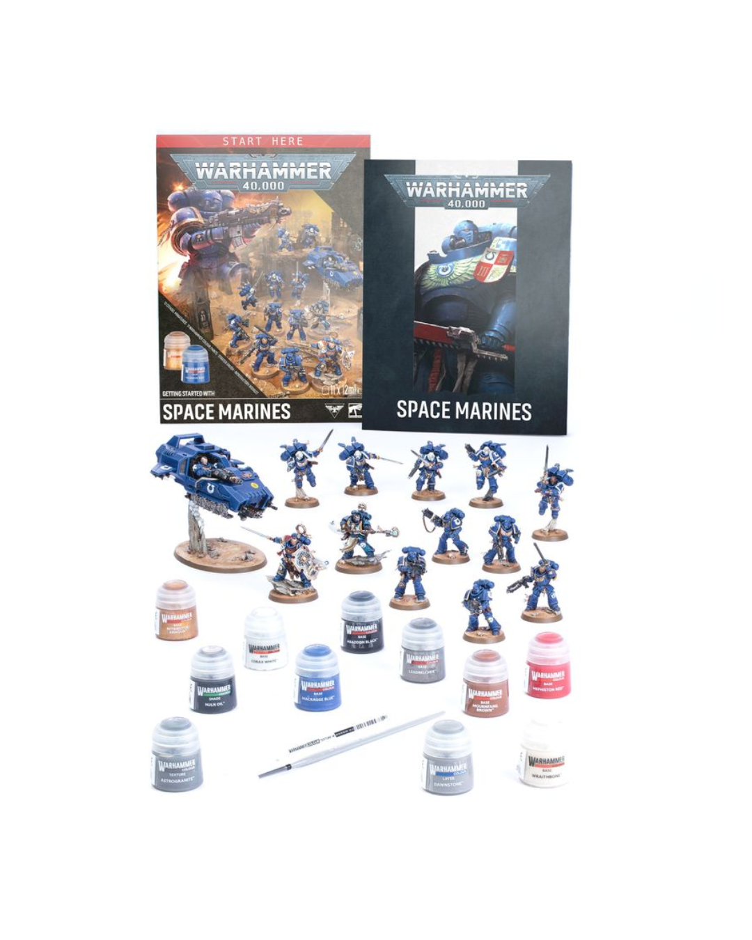 Warhammer 40k Space Marines starter kit containing painted miniatures, various paint bottles, a brush, and two instruction booklets on a plain white background.