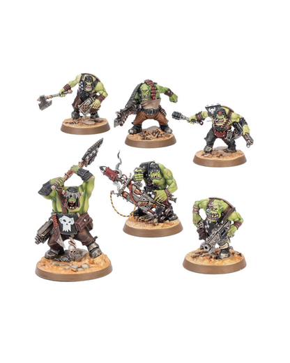 Five painted fantasy orcs miniatures on round bases, shown against a plain white background. The figures have green skin, brown and black clothing, and various weapons, with one holding a skull and another featuring a skull-like emblem on the chest.
