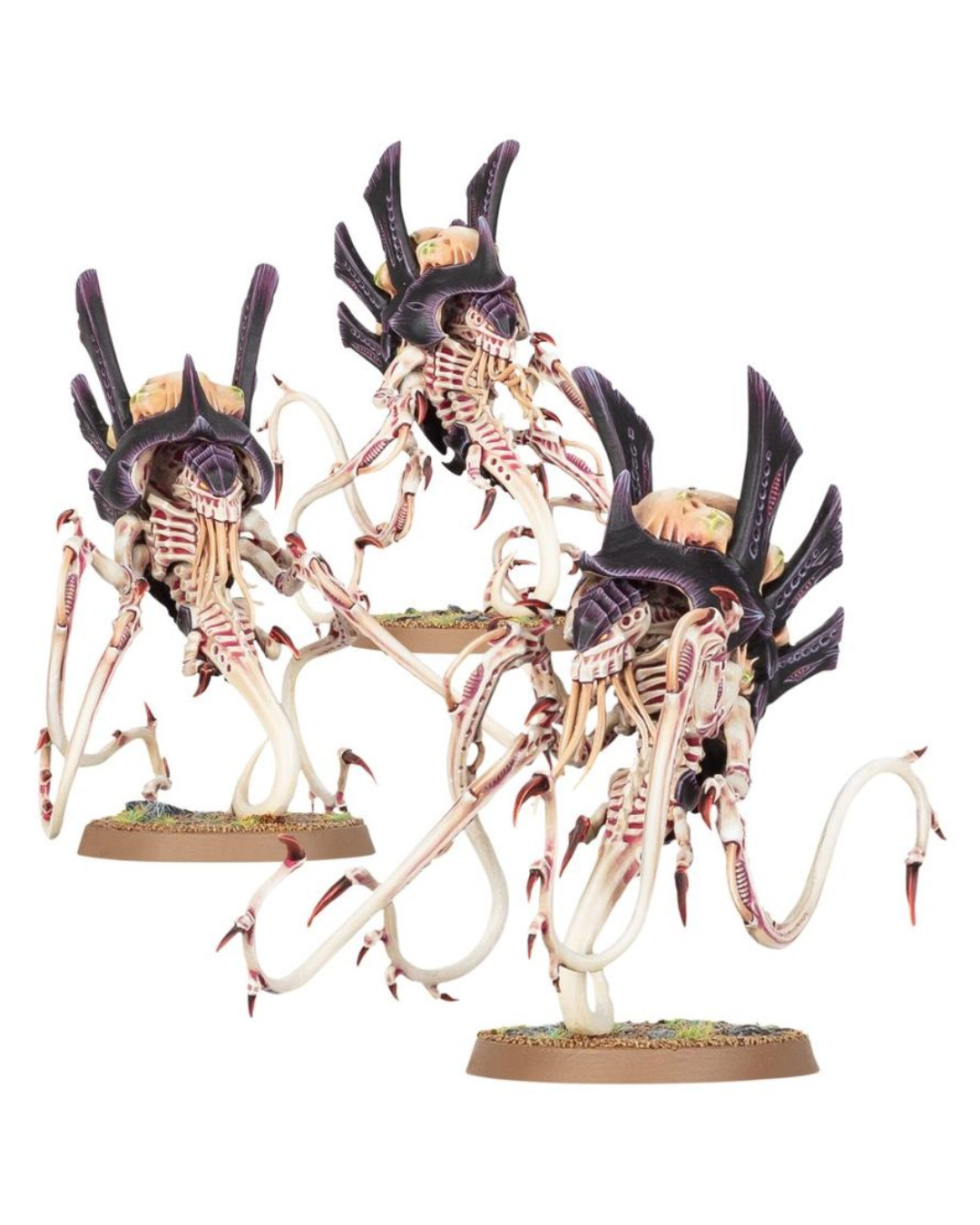 Three painted fantasy creature miniatures with elongated white bodies, black spiky armor, and multiple tentacle-like limbs, displayed on round bases against a plain white background.