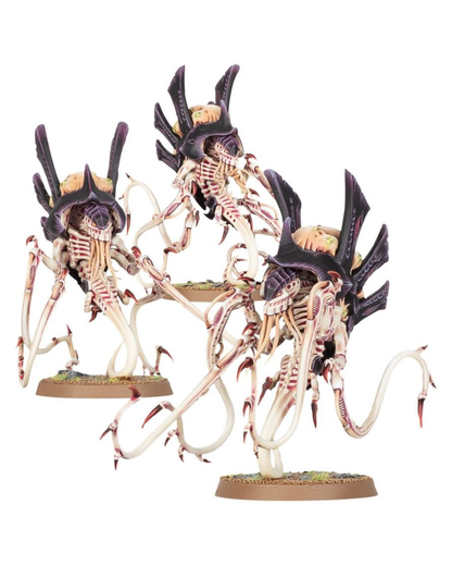 Three painted fantasy creature miniatures with elongated white bodies, black spiky armor, and multiple tentacle-like limbs, displayed on round bases against a plain white background.