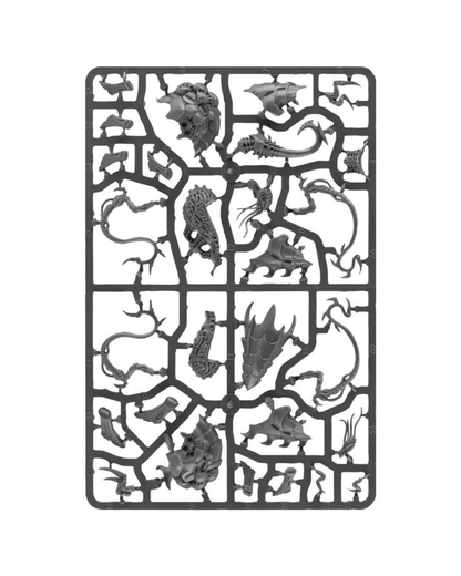 A rectangular gray plastic sprue holding multiple unpainted miniature fantasy creature parts, shown on a plain white background.