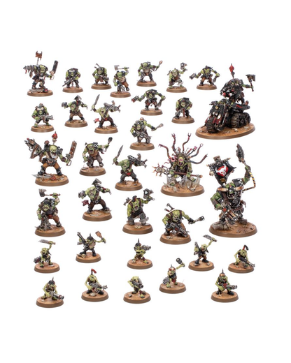 A set of painted fantasy miniature figurines arranged on a plain white background. The collection includes multiple small green-skinned warrior figures with metallic armor, some mounted on round bases and others standing alone, with one larger monstrous figure near the center-right.
