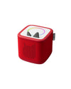 Red electronic device with a white top on a white background